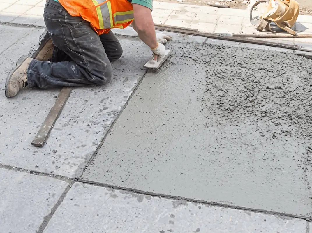 Professional repairing a concrete floor in Cleveland, OH