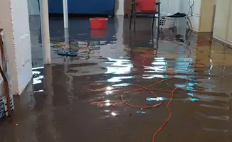 Basement with boiler, cabinets and washing machine completely flooded in Cleveland, OH